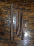 Door gap seal positioned under a door to help block mice, snakes, and insects